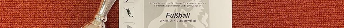 Urkunde und Pokal
